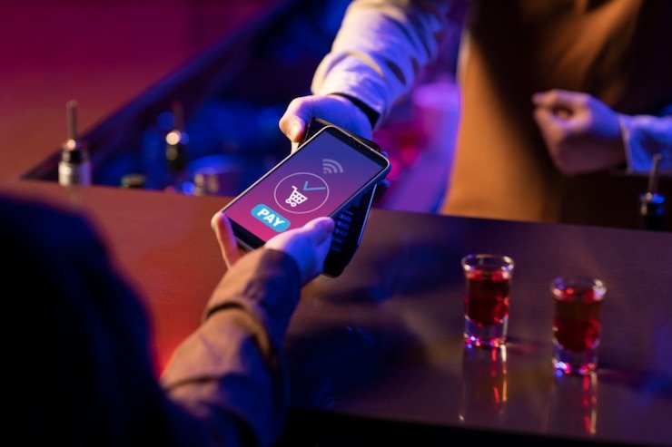 hoki108 slot app interface showing Wild Rift match broadcast alongside live casino table